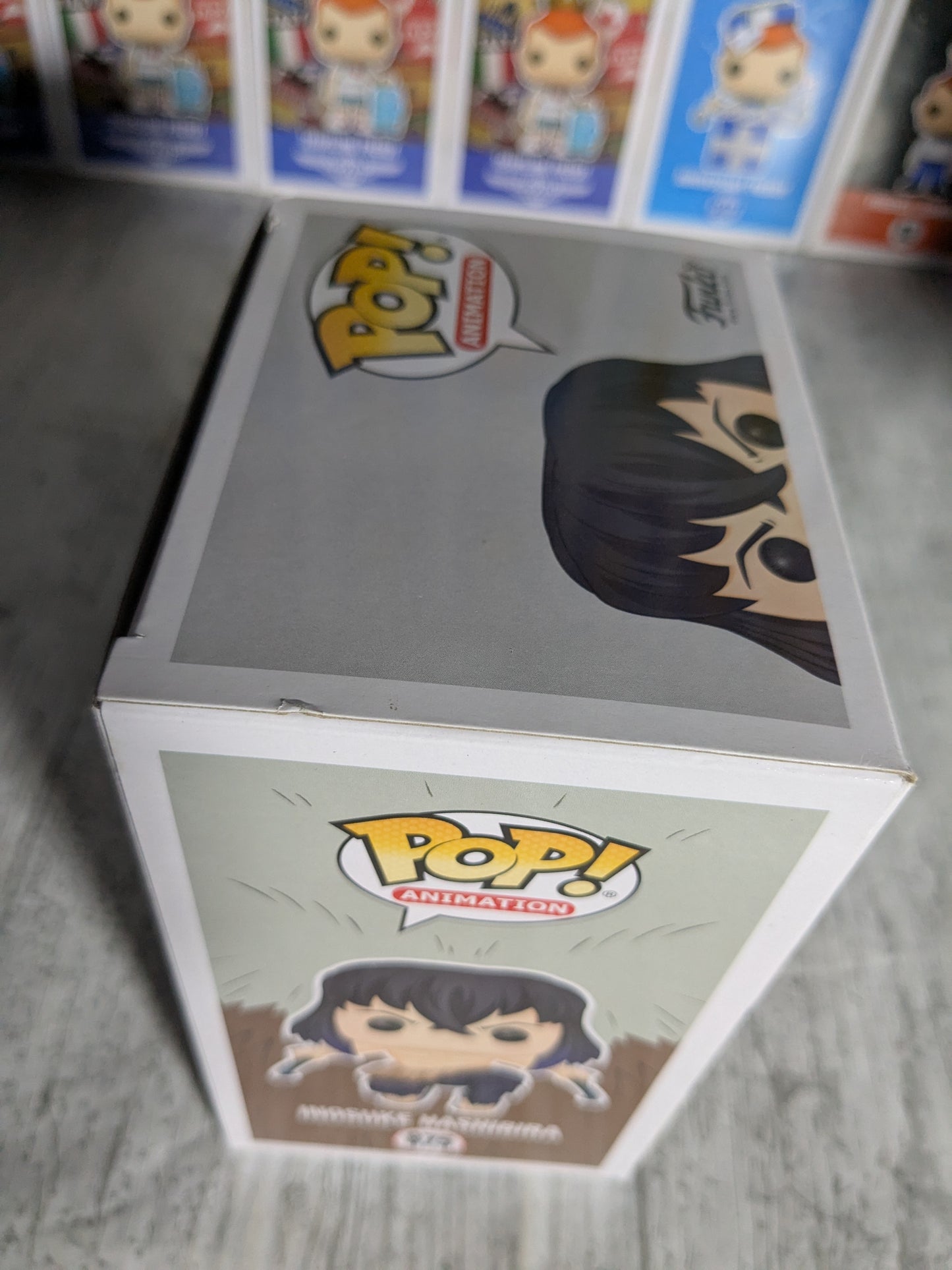Funko pop 875 : Inosuke Hashibira (Flocked Chase/Damaged Box)