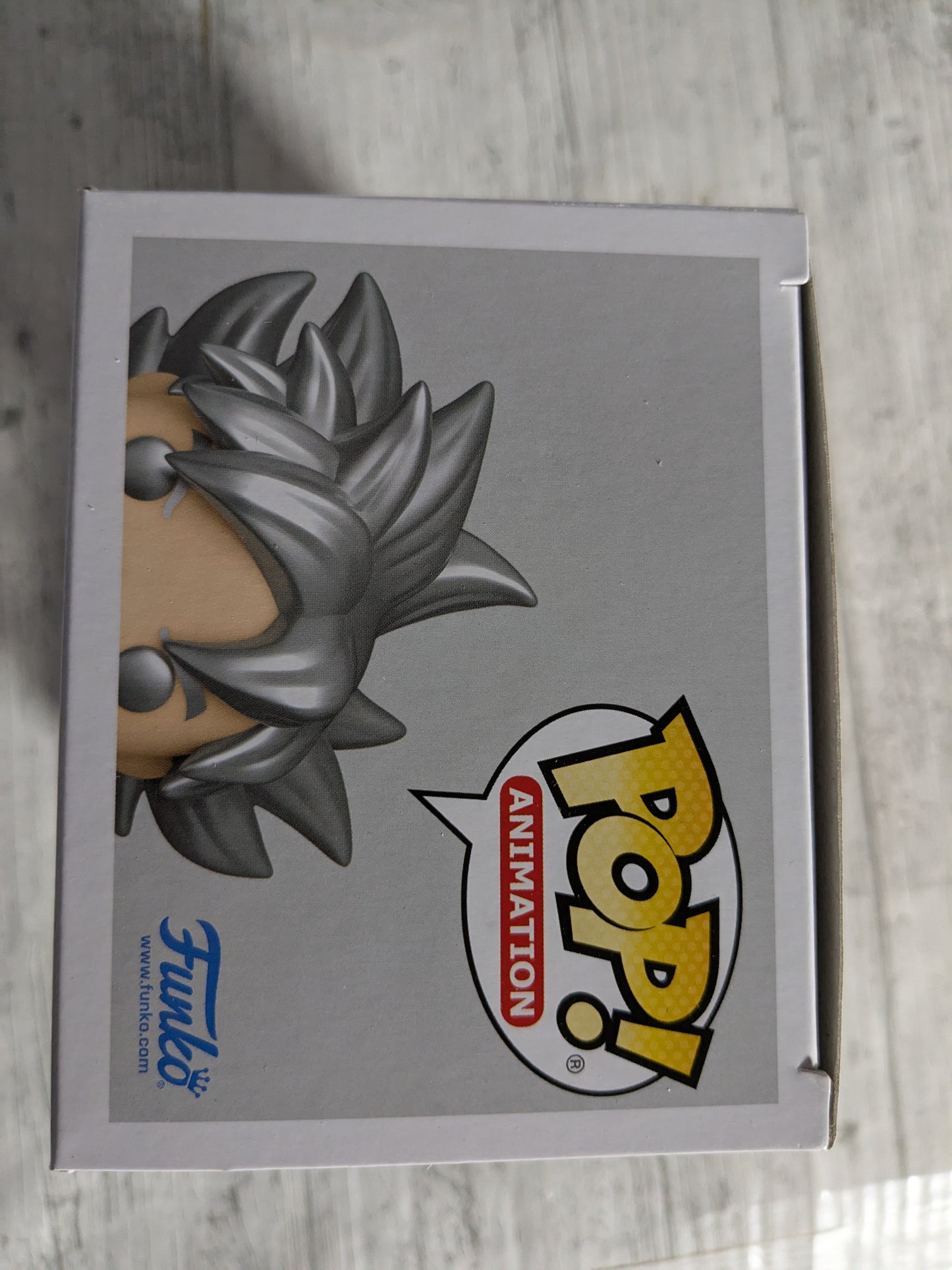 Funko pop 1694 : Goku (Ultra instinct) (Glow)