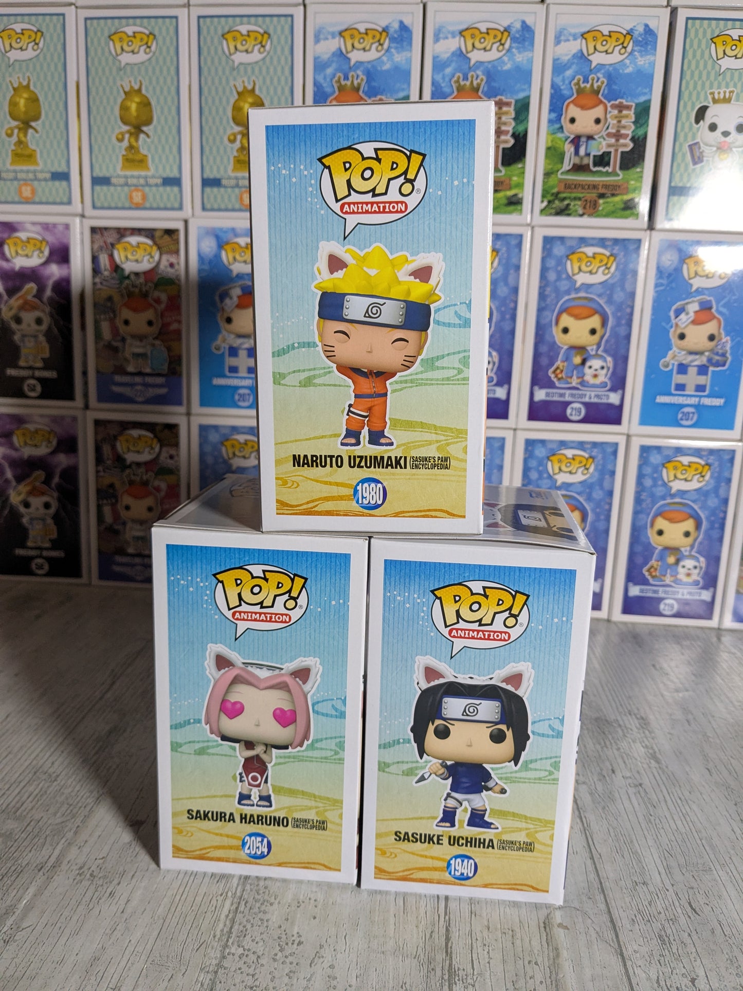 Funko pop Naruto Shippuden - Sasuke's Paw Encyclopedia Bundle