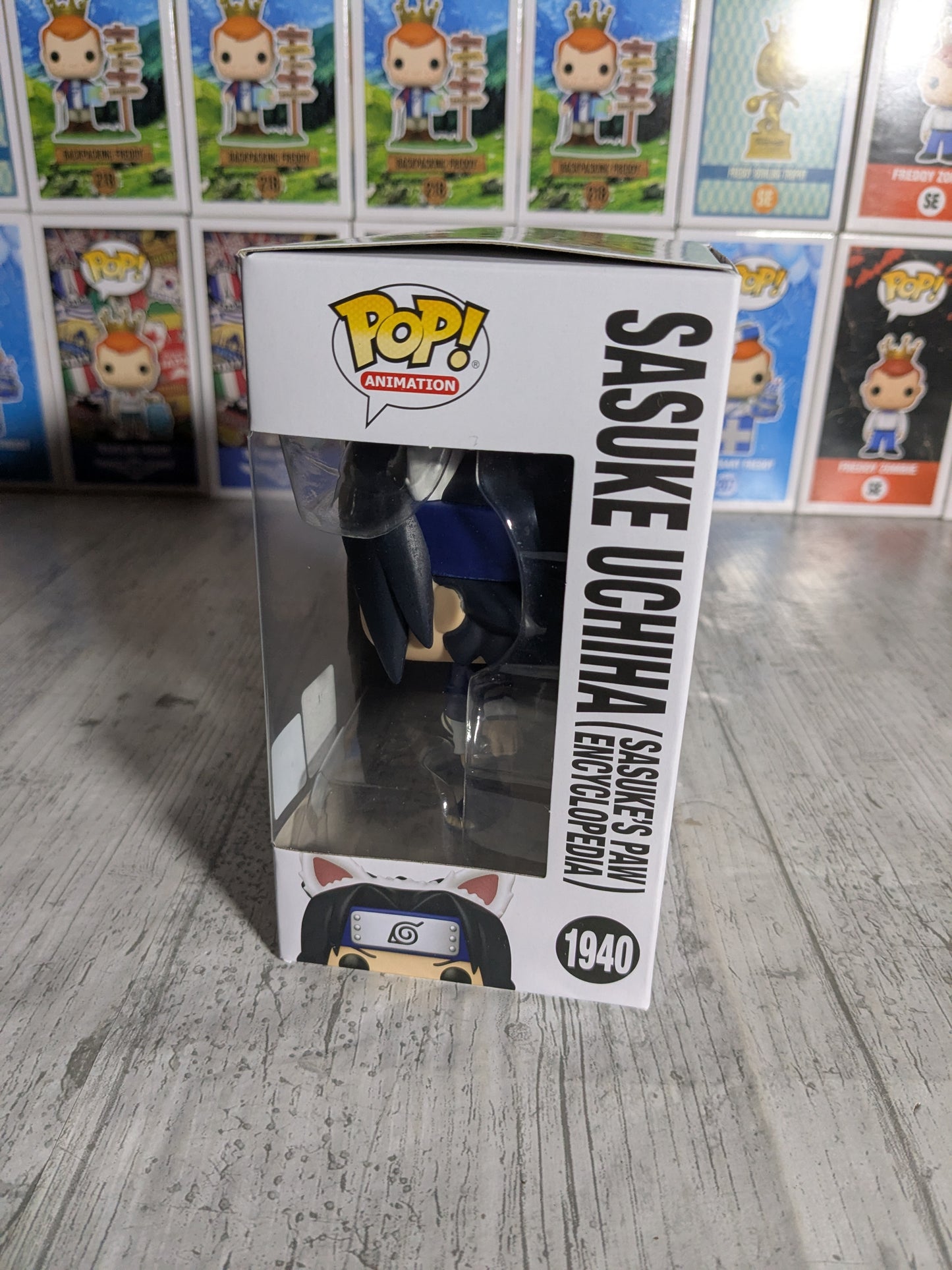 Funko pop Naruto Shippuden #1940 - Sasuke Uchiha Sasuke's Paw Encyclopedia (WC2025)