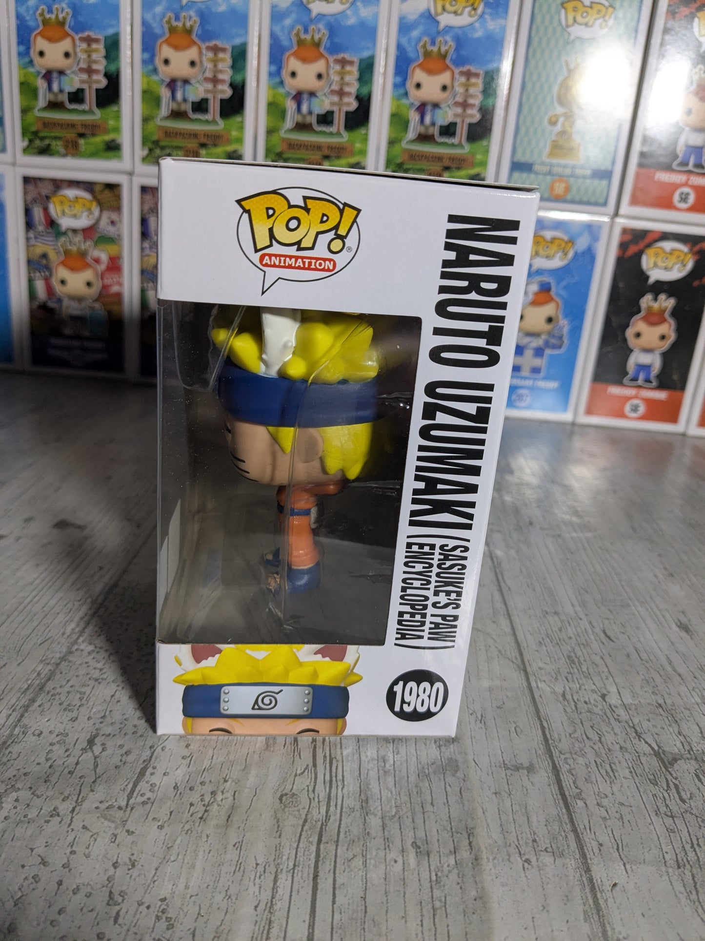 Funko pop Naruto Shippuden #1980 - Naruto Uzumaki Sasuke's Paw Encyclopedia (SC2025)