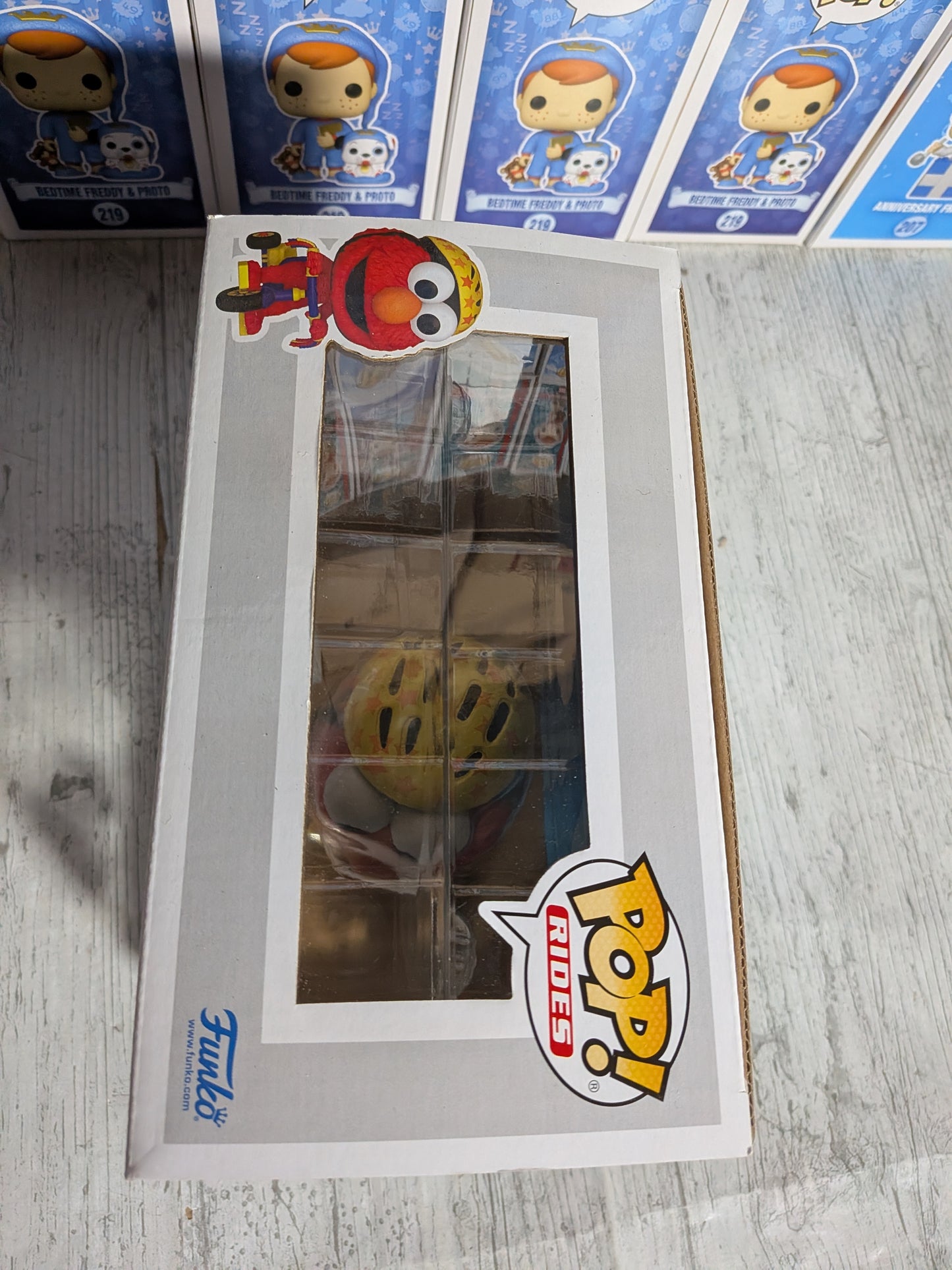 Funko Pop Sesamstraße Nr. 309 – Elmo auf dem Dreirad (beflockt)