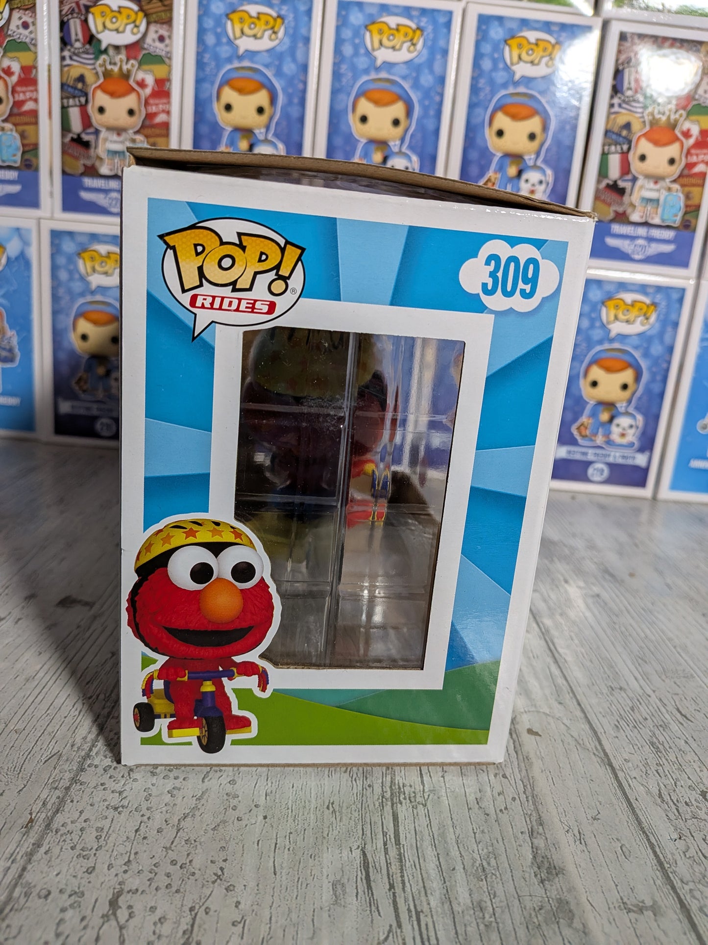 Funko Pop Sesamstraße Nr. 309 – Elmo auf dem Dreirad (beflockt)