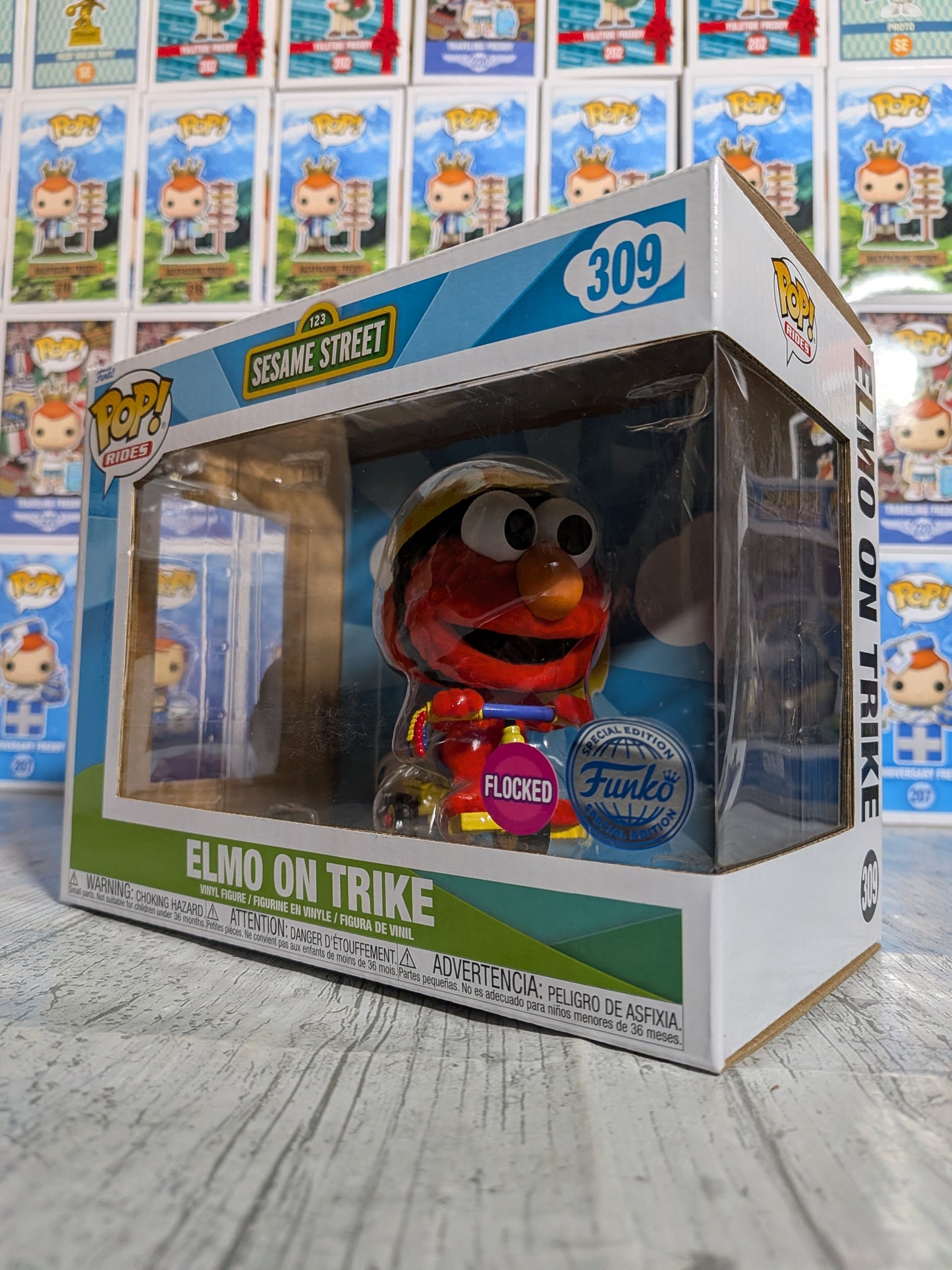 Funko Pop Sesamstraße Nr. 309 – Elmo auf dem Dreirad (beflockt)