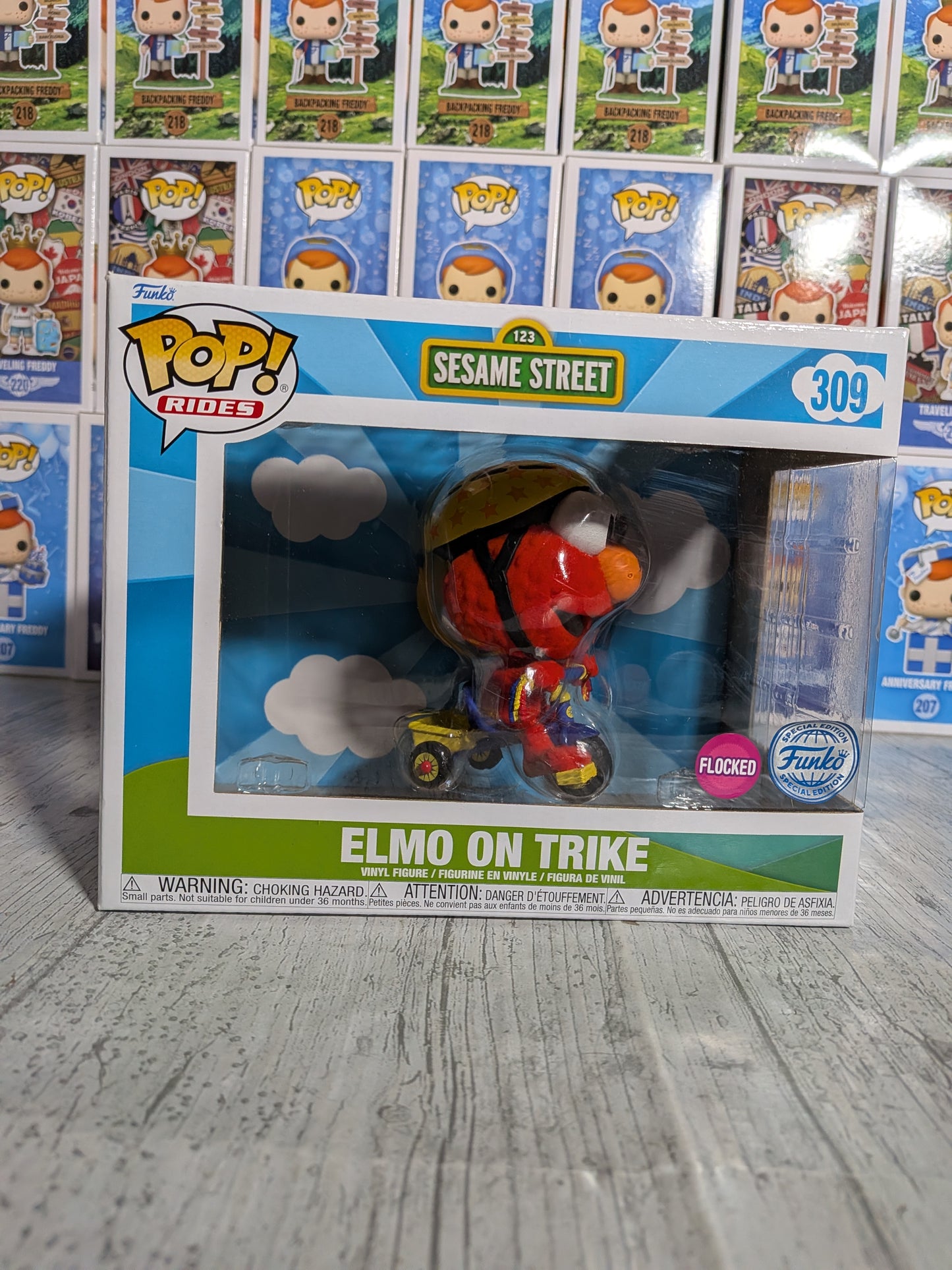 Funko Pop Sesamstraße Nr. 309 – Elmo auf dem Dreirad (beflockt)