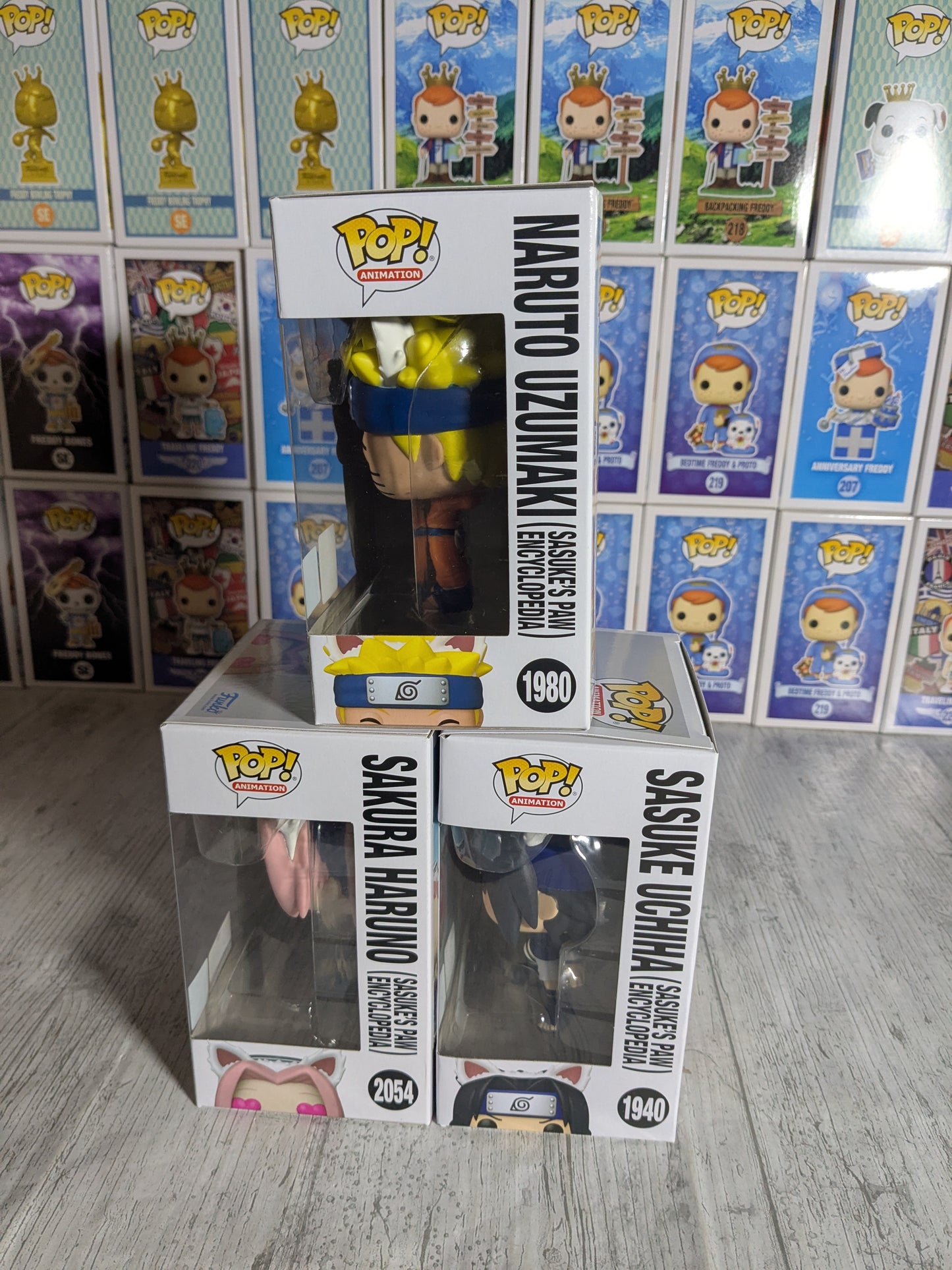 Funko pop Naruto Shippuden - Sasuke's Paw Encyclopedia Bundle